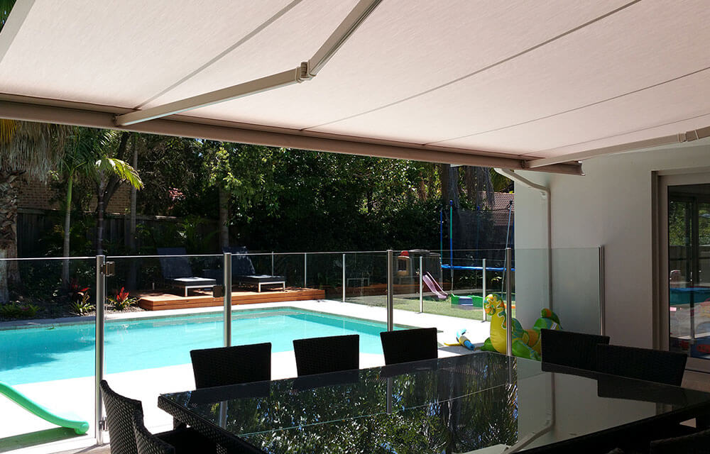 Awnings from the blind shop coveirng a canberra backyward pool