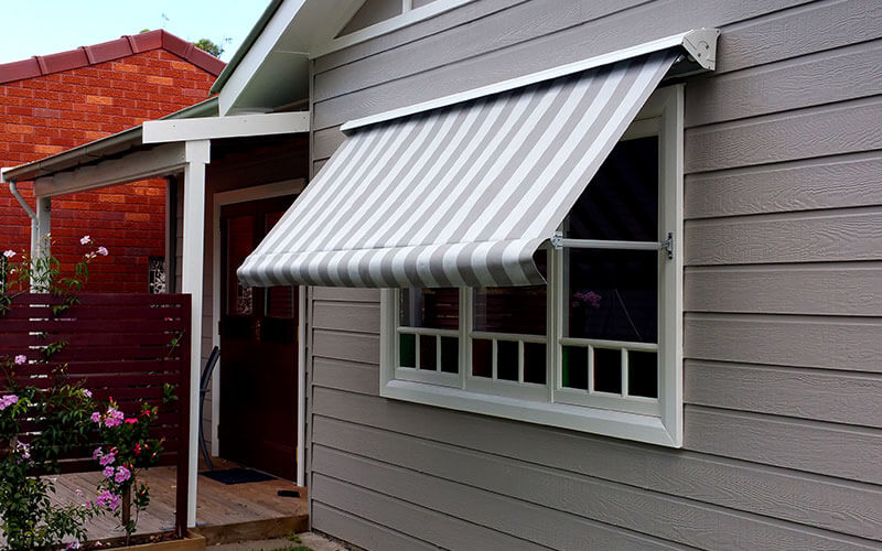 A canberra home with a Pivot Arm Awning from The Blindshop